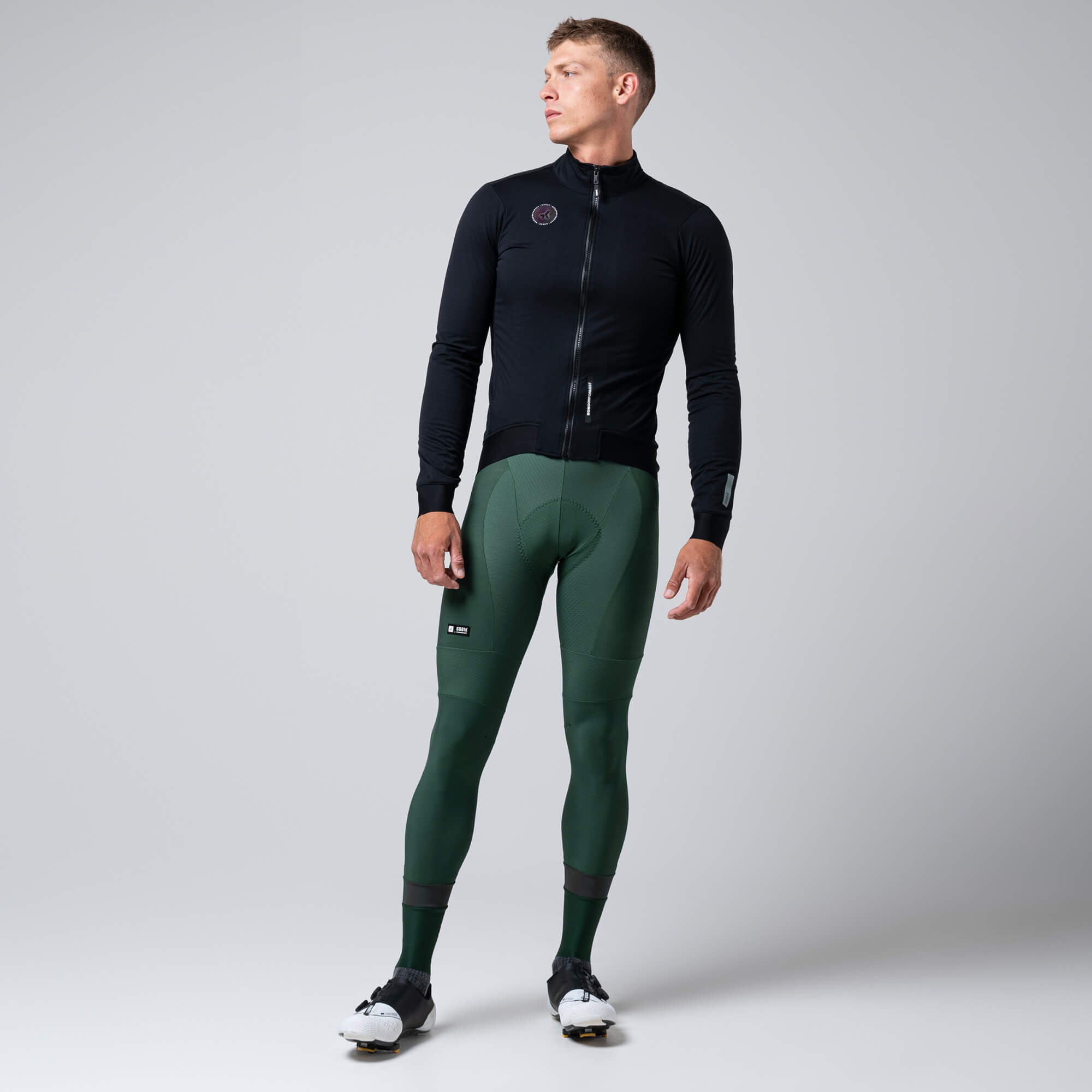 Man wearing GOBIK Armour 2.0 Thermal Jacket - Unisex in black with full zip and fitted design for cold weather cycling