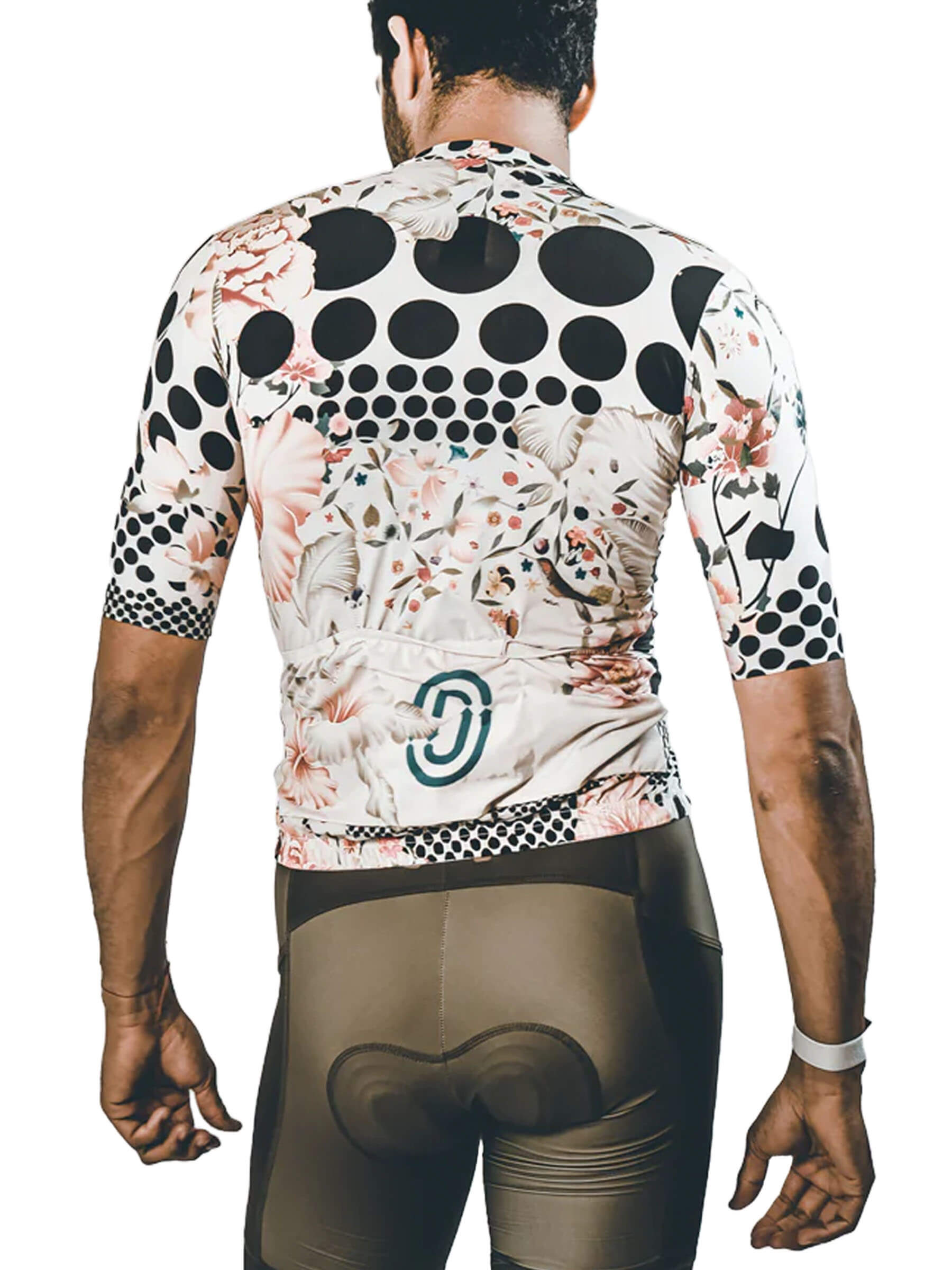 Man wearing Ostroy Omloop Jersey - Men's with floral and circular pattern shown from back view with cycling shorts