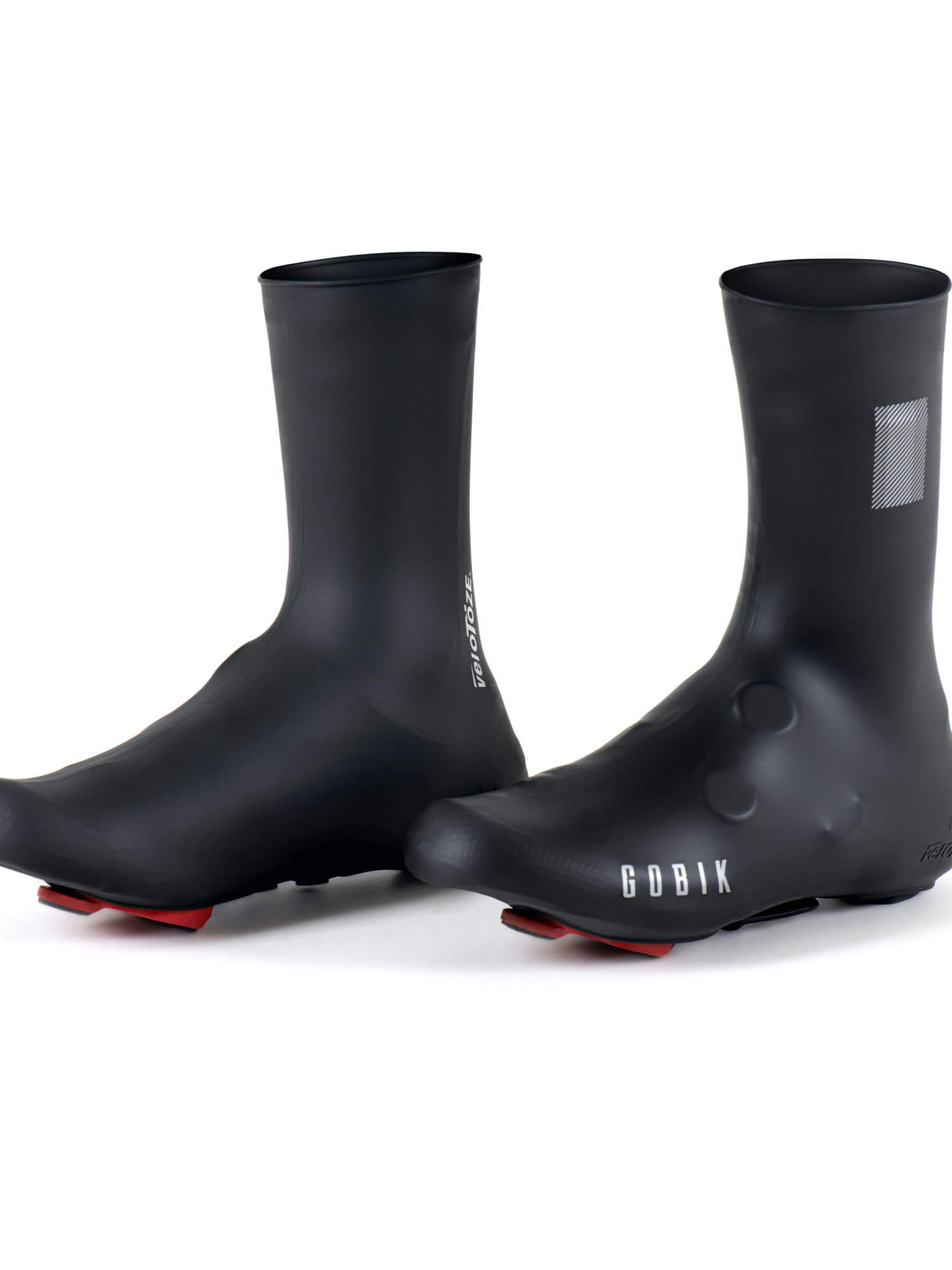 Pair of black GOBIK VELOTOZE Snaps Tall Overshoes - Unisex with seamless design and snap closures against white background