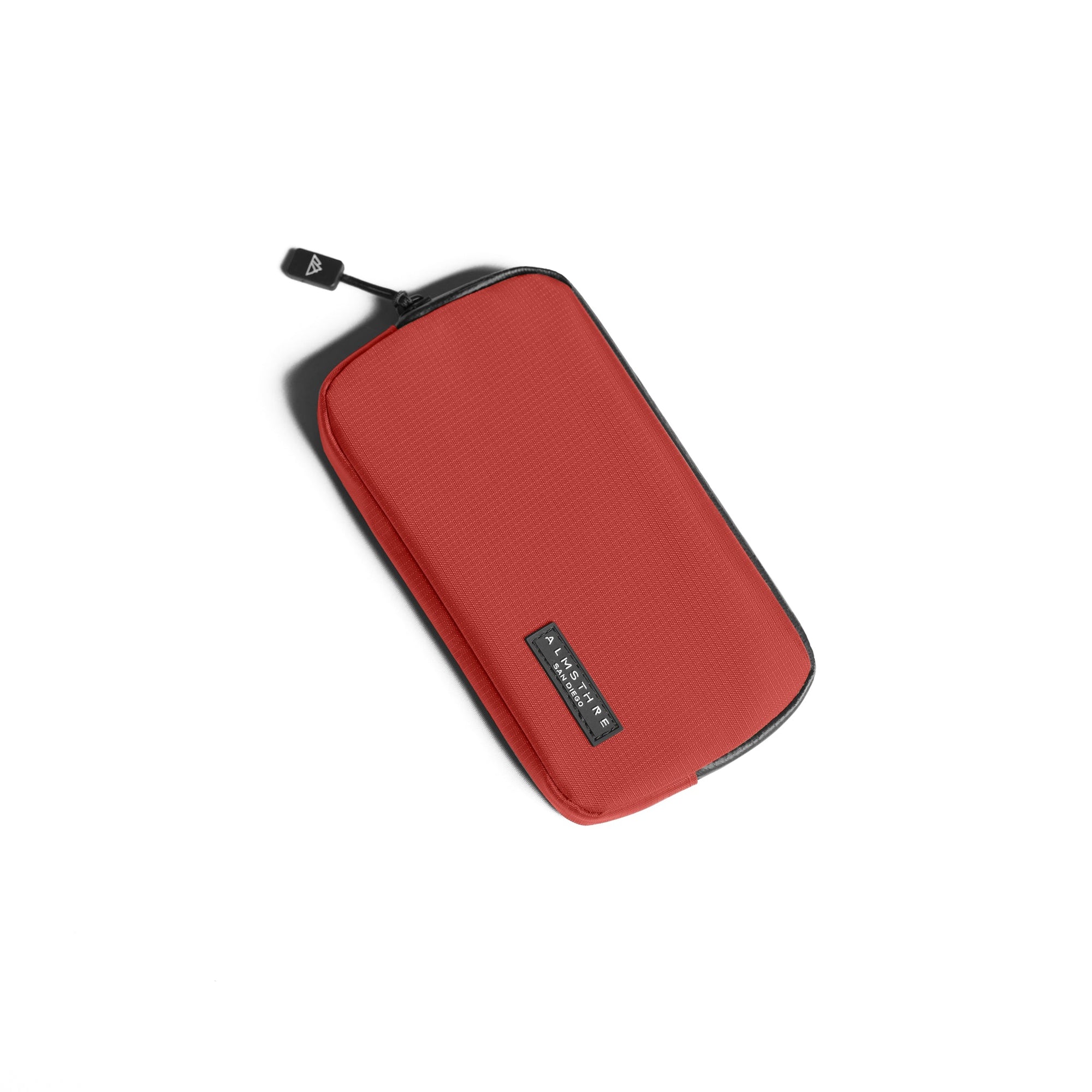 ALMSTHRE Ride Wallet in red with durable ripstop nylon fabric and waterproof zipper against white background