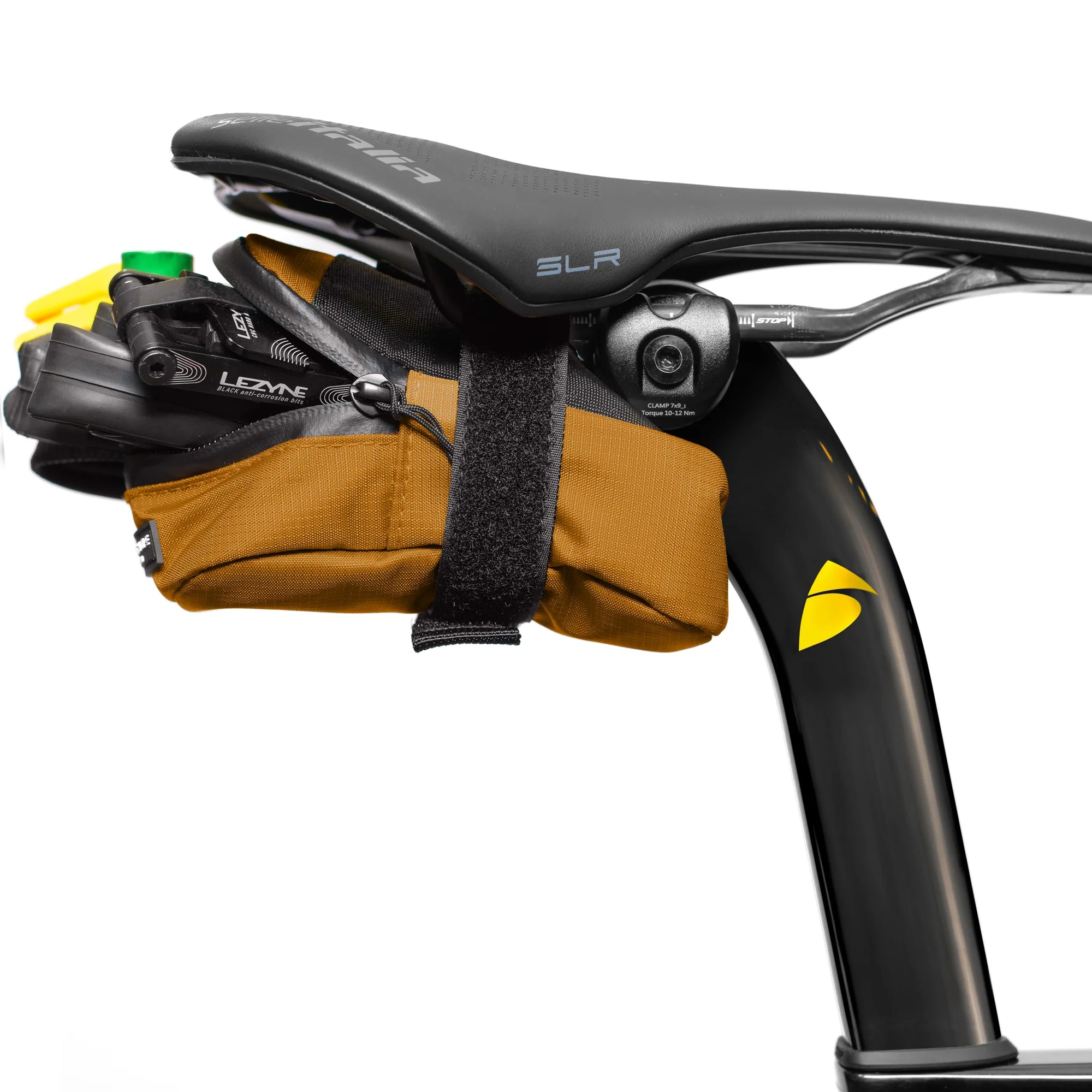 ALMSTHRE Signature Saddle Bag in brown attached under bike seat with adjustable strap and compact storage design