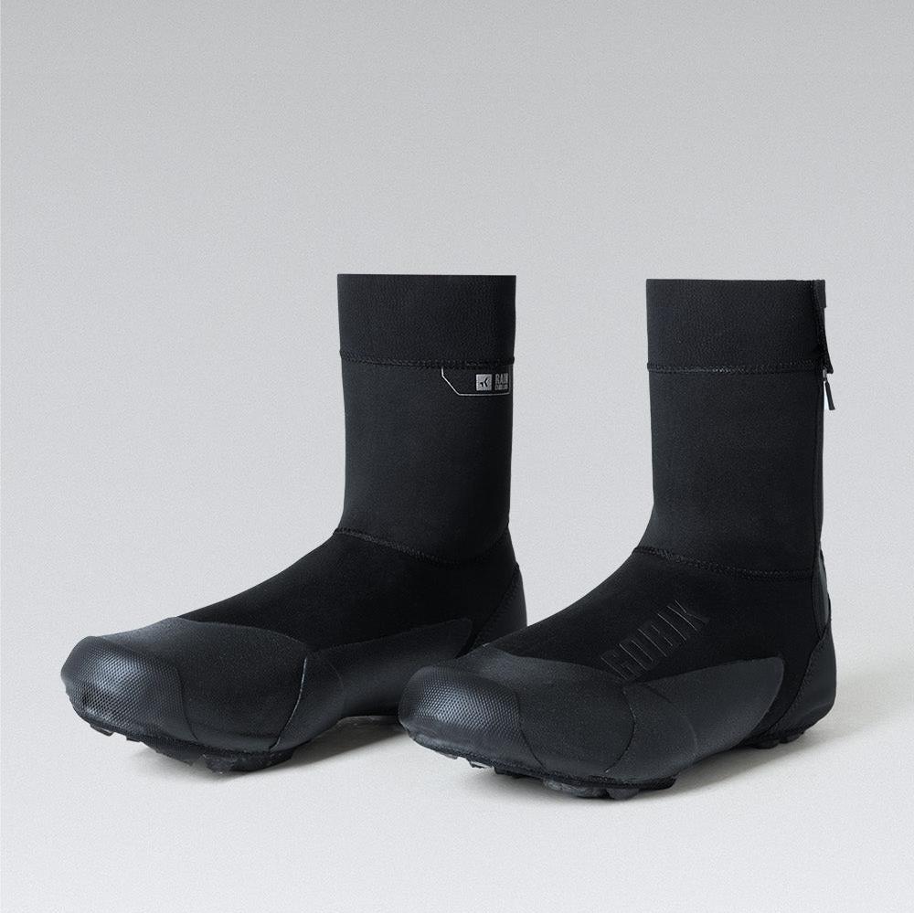 Pair of black GOBIK Avert Winter Overshoes shown side by side on neutral background with protective sole and high ankle coverage