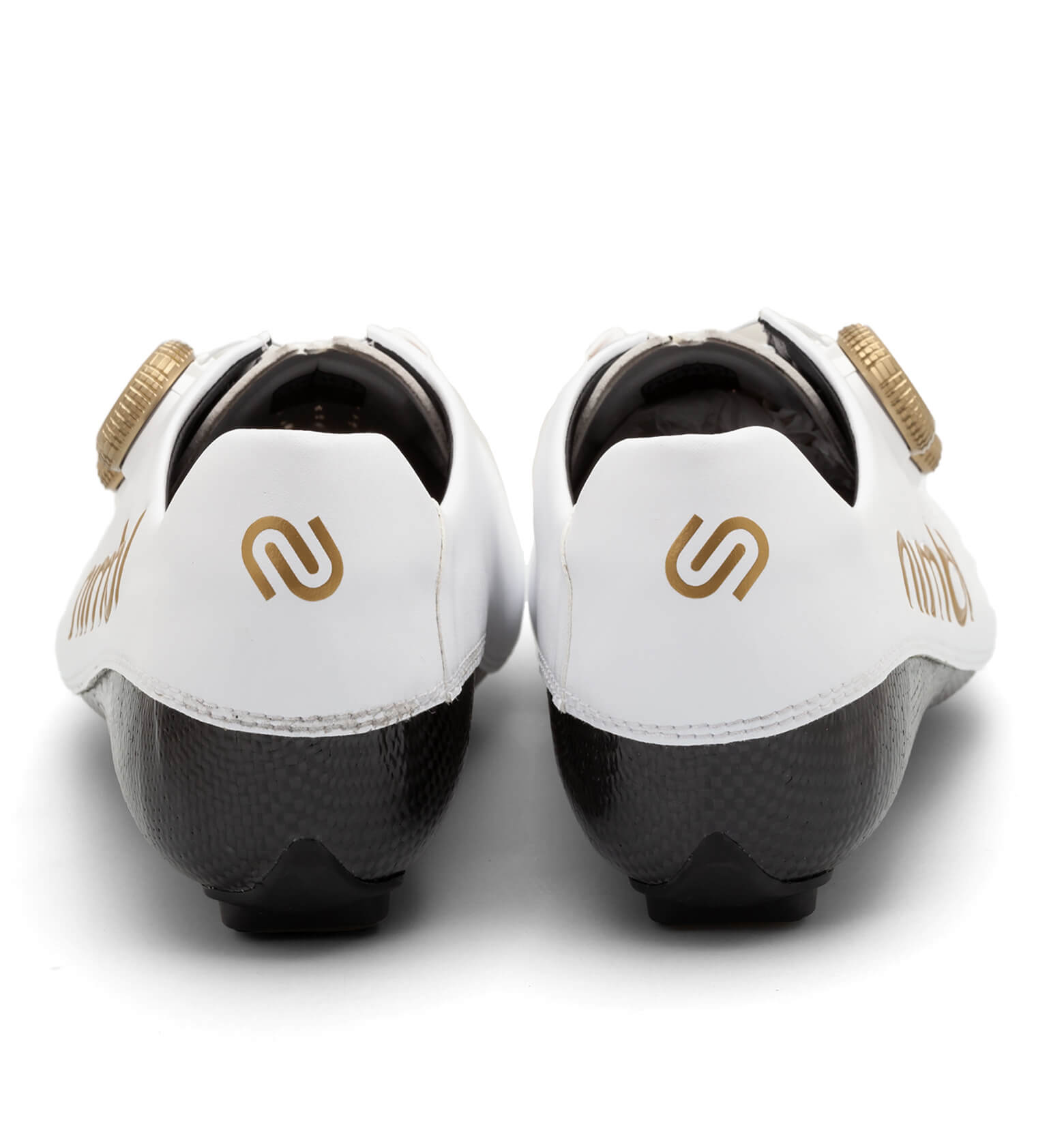 Rear view of white Nimbl ULTIMATE cycling shoes with gold logo and carbon soles on white background