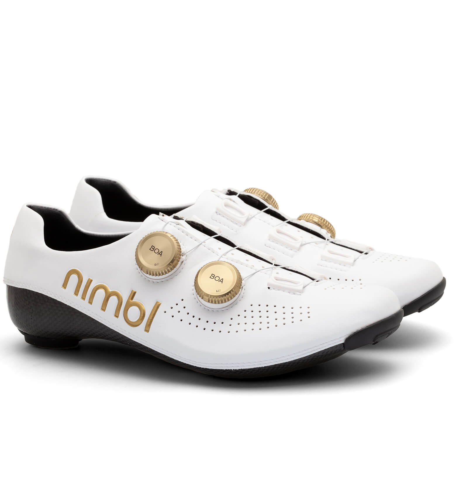 Pair of white Nimbl ULTIMATE cycling shoes with gold dial closures and black sole shown at side angle