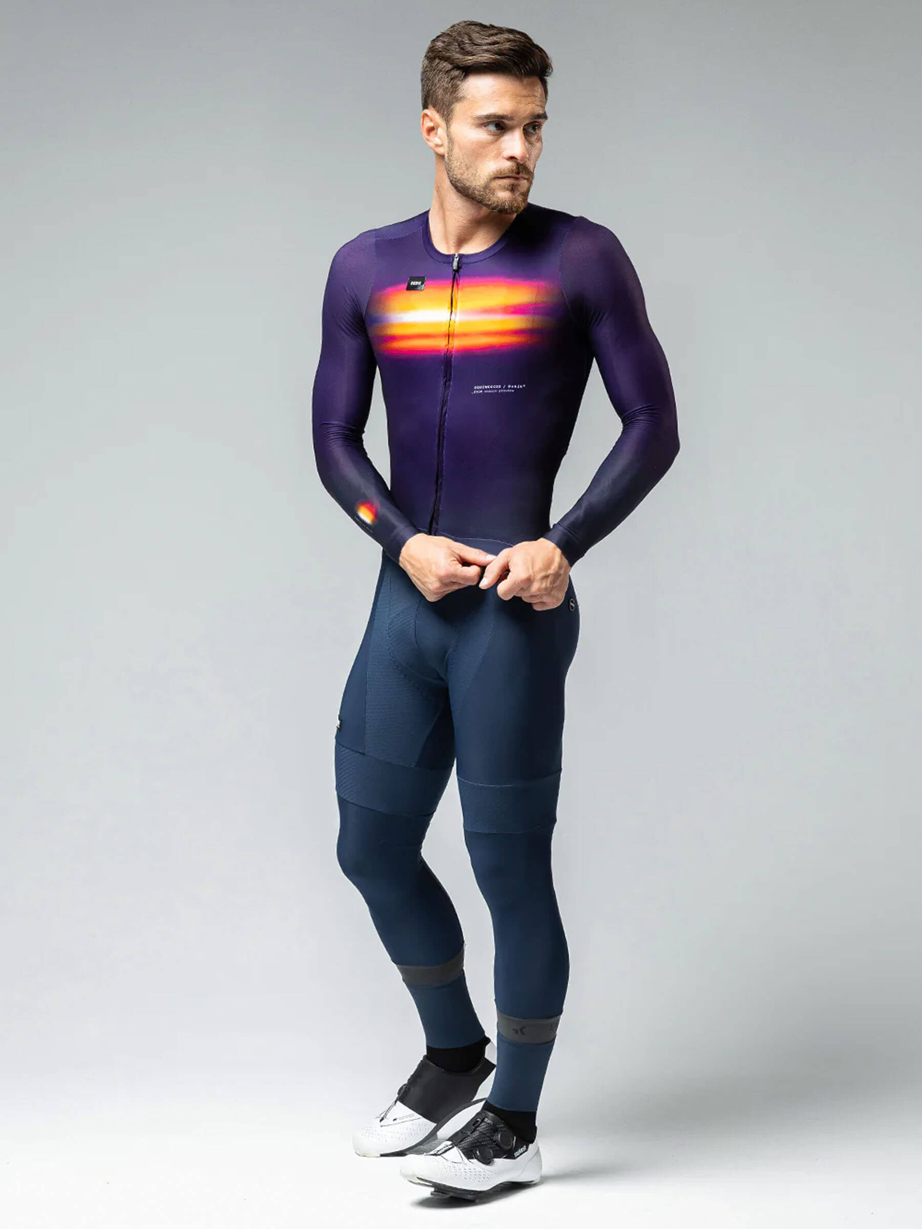 Full view of the Nebula jersey worn by a cyclist, showing the fit and pocket placement.